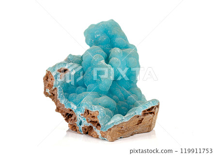 Macro pink Smithsonite mineral stone on microcline on white background Macro pink Smithsonite mineral stone on microcline on white background 119911753