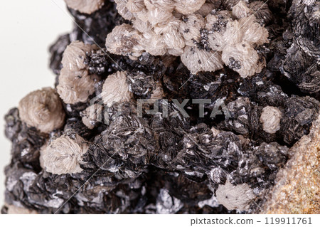 Macro stone groutite mineral on white background Macro stone groutite mineral on white background 119911761