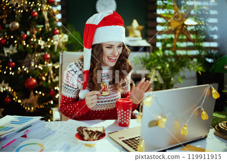 happy elegant small business owner woman video chatting happy elegant small business owner woman video chatting 119911915
