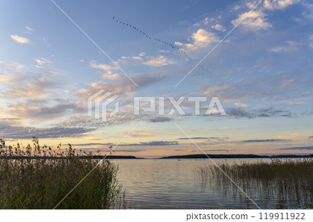 Lake Seksty. Landscape of Masuria in Poland, Karwik village in the Pisz area. Lake Seksty. Landscape of Masuria in Poland, Karwik village in the Pisz area. 119911922