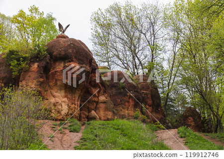 Eagle sculpture monument at the Red Stones, a landmark of the Kislovodsk National Park 119912746