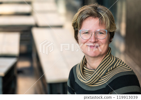 Headshot of a 38 yo white woman with short hair, Koekelberg, Brussels, Belgium Headshot of a 38 yo white woman with short hair, Koekelberg, Brussels, Belgium 119913039