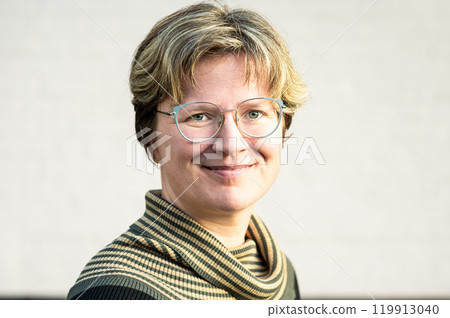 Headshot of a 38 yo white woman with short hair, Koekelberg, Brussels, Belgium Headshot of a 38 yo white woman with short hair, Koekelberg, Brussels, Belgium 119913040