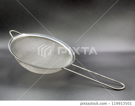 Metallic colander for cooking closeup. 119913501