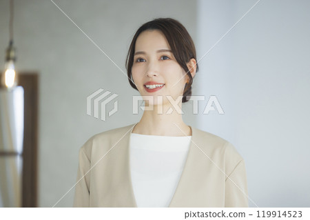 Young woman in a suit Young woman in a suit 119914523