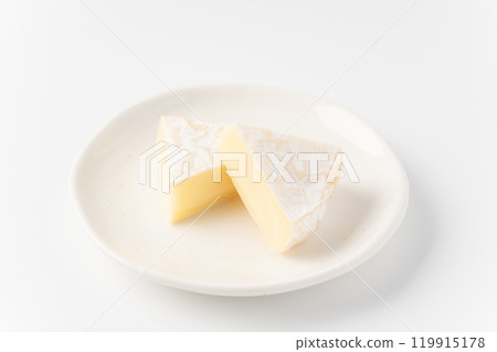 Sliced Camembert cheese on a plate 119915178