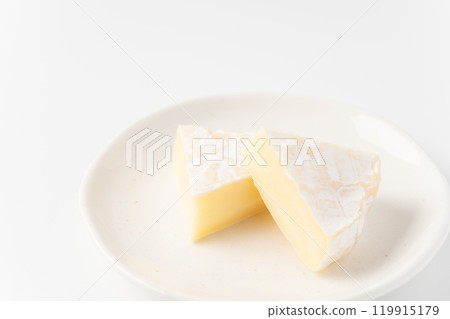 Sliced Camembert cheese on a plate Sliced Camembert cheese on a plate 119915179