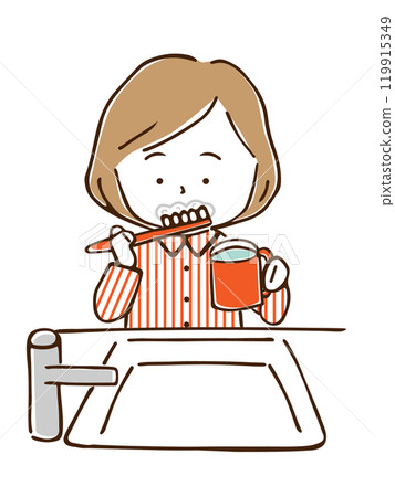 A woman in pajamas brushing her teeth 119915349