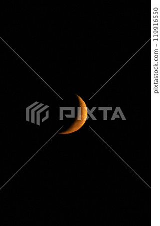 Crescent moon rising in the night sky Crescent moon rising in the night sky 119916550