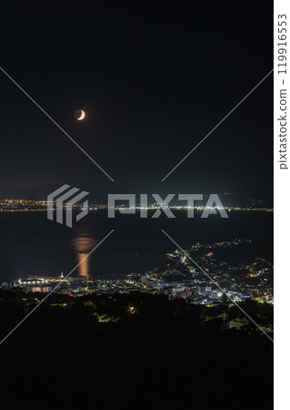 Night view from Windmill Hill in Wellington, New Zealand and a crescent moon floating in the night sky Night view from Windmill Hill in Wellington, New Zealand and a crescent moon floating in the night sky 119916553