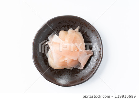 A small plate of gari (pickled ginger in sweet vinegar) 119916689