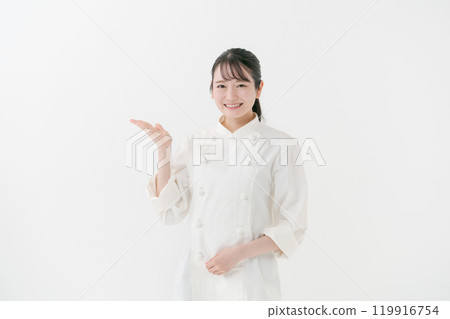 Portrait of a young female chef 119916754