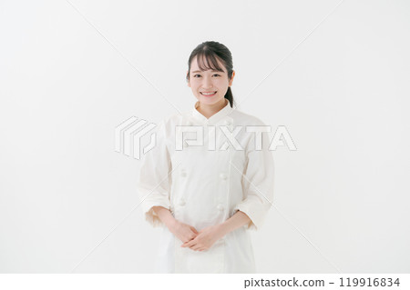 Female chef doing a fist pump Female chef doing a fist pump 119916834