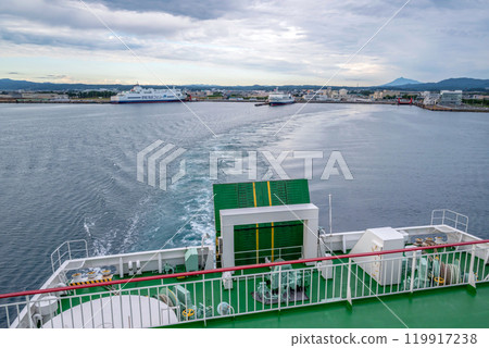 A ferry and its wake just after departure A ferry and its wake just after departure 119917238