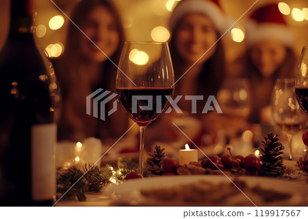 Photo of nice joyful family people drinking red wine and having Christmas dinner. Photo of nice joyful family people drinking red wine and having Christmas dinner. 119917567
