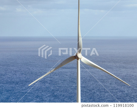 Wind power station with wind turbines with an ocean on the background, Wind power station with wind turbines with an ocean on the background, 119918100