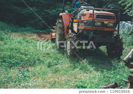 Tractor and farmer Tractor and farmer 119918926