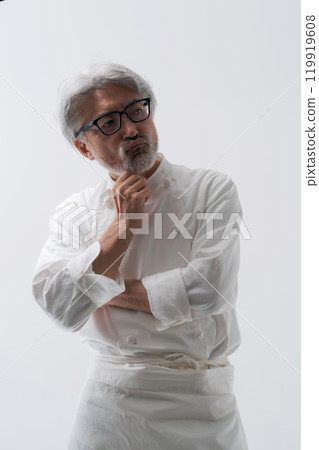 A male chef thinking A male chef thinking 119919608