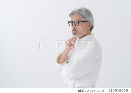 A male cook thinking 119919639
