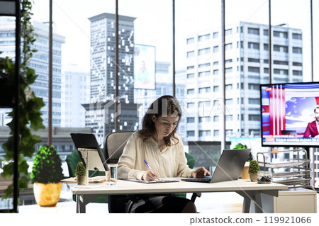 Business entrepreneur signing contracts and documents to approve the next activity for enterprise management and development. Female CEO working on legal paperwork, authorization. 119921066