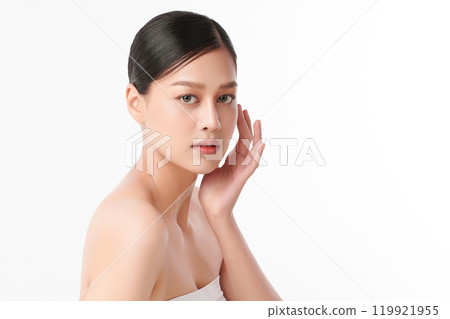 Beautiful young asian woman with clean fresh skin on white background, Face care, Facial treatment, Cosmetology, beauty and spa, Asian women portrait. Beautiful young asian woman with clean fresh skin on white background, Face care, Facial treatment, Cosmetology, beauty and spa, Asian women portrait. 119921955