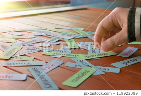 hand picking up cards in class 119922389