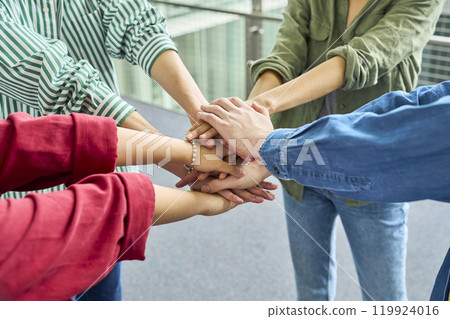 Multinational people forming a circle Teamwork image 119924016