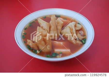 delicious red tofu soup with crackers 119924578
