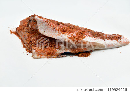 Cleaned and washed sea bass in aromatic spices. Cleaned and washed sea bass in aromatic spices. 119924926