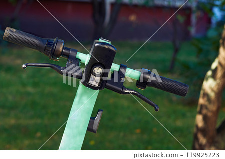 Electric scooter. Steering wheel, headlight, control panel Electric scooter. Steering wheel, headlight, control panel 119925223