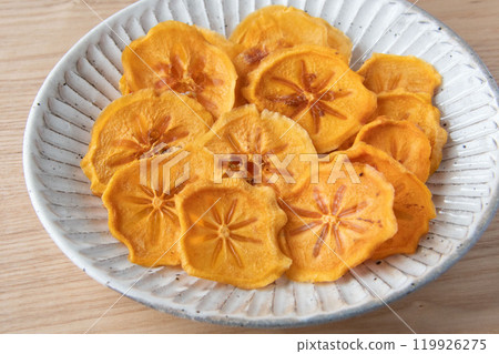 Dried persimmon slices Dried persimmon slices 119926275