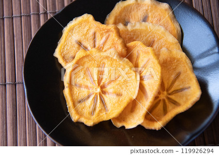 Dried persimmon slices Dried persimmon slices 119926294
