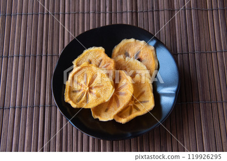 Dried persimmon slices Dried persimmon slices 119926295