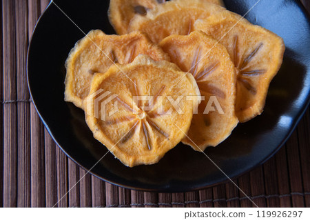 Dried persimmon slices Dried persimmon slices 119926297