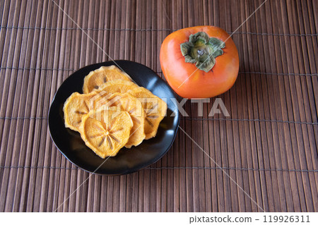 Dried persimmon slices Dried persimmon slices 119926311