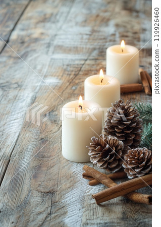 Christmas Still Life with Pinecones, Cinnamon, and Candleligh 119926460