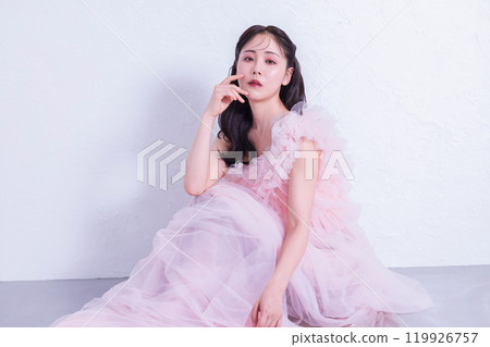 A woman in a dress A woman in a dress 119926757