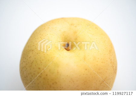 Image of a pear on a table (stock photo) Image of a pear on a table (stock photo) 119927117