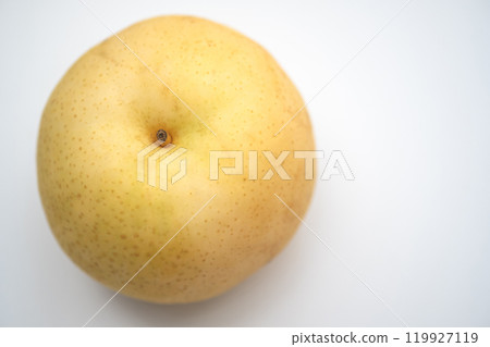 Image of a pear on a table (stock photo) Image of a pear on a table (stock photo) 119927119