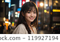 Beautiful Asian woman walking in the city at night 119927194