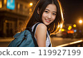Beautiful Asian woman walking in the city at night 119927199