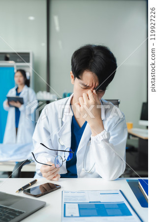 Medical students eyestrain fatigued from computer work, stressed  suffer from headache bad vision sight problem sit at office. 119927226