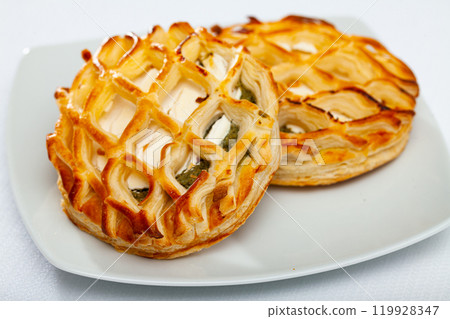 Pastry stuffed with goat cheese and spinach Pastry stuffed with goat cheese and spinach 119928347
