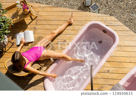 Top View Sunbathing on Wooden Deck 119930615