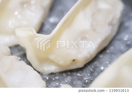 Image of wings being made from frozen dumplings (stock photo) 119931613