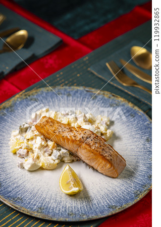 Traditional Christmas dinner in Czech Republic - salmon fillet with potato salad 119932865
