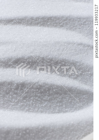 Natural white food salt fine grind, top view Natural white food salt fine grind, top view 119933217