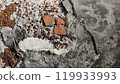 Close-up of textured wall showing bricks and concrete details. 119933993