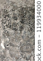Textured stone wall with abstract patterns, grey and white hues. 119934000