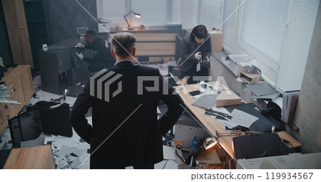 Office robbery case: High angle of crime investigation team working Office robbery case: High angle of crime investigation team working 119934567